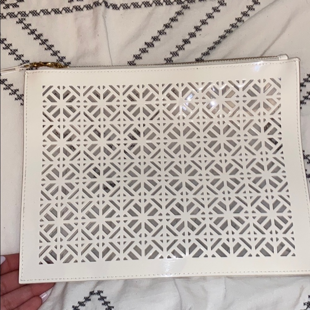 a Tory Burch wristlet